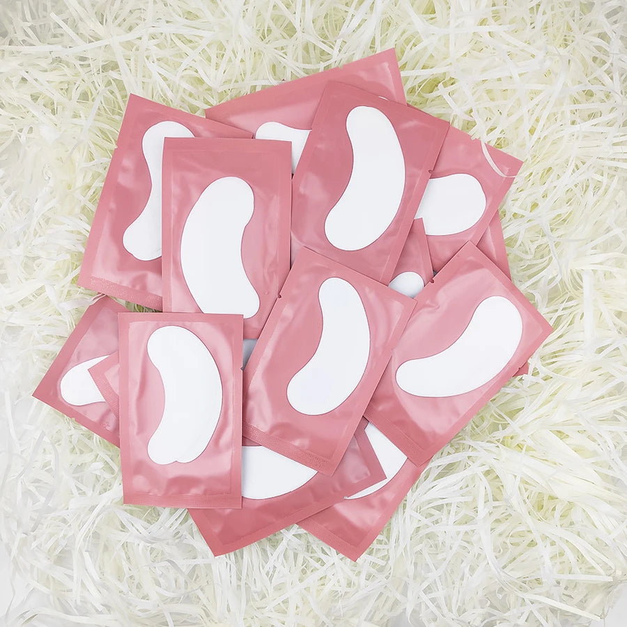 Patchs pour les yeux, 25/50/100 paires, tampons pour la construction de faux cils, en papier gel rose, autocollants non pelucheux LAUKISS